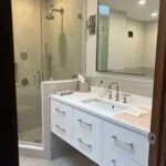 Glass shower with white double vanity