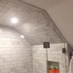 Tile shower under sloped ceiling