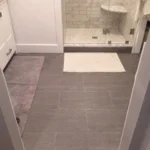 Bathroom with tile flooring and bath mat