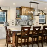 White kitchen with wood beam range hood and dining table